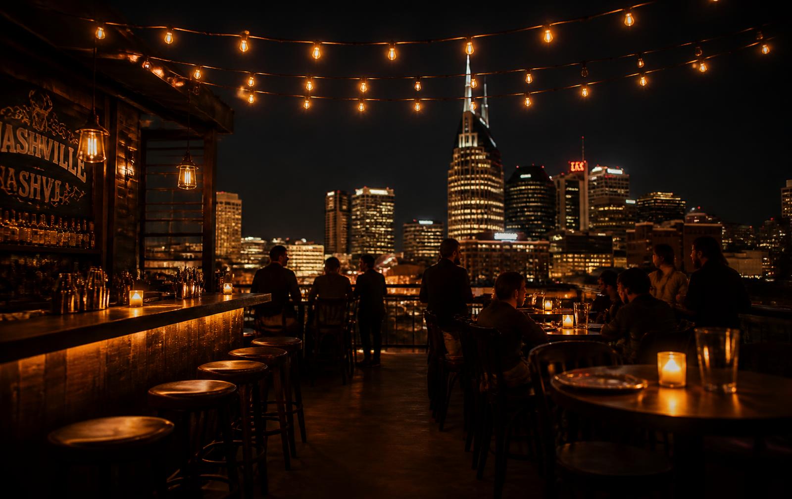 Rooftop bar at dusk overlooking the Nashville skyline